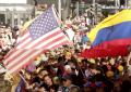I venezuelani nel mondo che festeggiano la caduta di Maduro