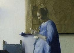 "Donna in blu che legge una lettera": il maestro olandese Vermeer  all'apice  del successo