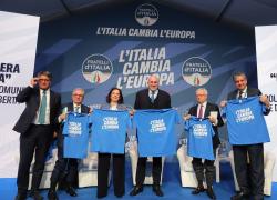Presidente di Leonardo Pontecorvo e capo della cybersicurezza Bruno Frattasi sul palco con maglia FdI, è polemica