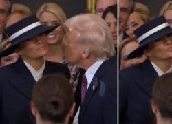 Donald Trump prova a baciare Melania all'insediamento, ma il cappello largo della First Lady lo tiene a distanza e impedisce il tocco - VIDEO