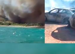 Incendio a Villasimius sulla spiaggia di Punta Molentis, oltre 100 auto carbonizzate, bagnanti in fuga, fiamme fino a riva - VIDEO