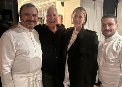 Milano accoglie le Olimpiadi: Charlize Theron al VERSO, Casa Slovacchia in Galleria Meravigli e il braciere che illumina i Dazi