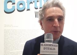 Alla presentazione della mostra &ldquo;La strada per Cortina&rdquo;, Michele Coppola dichiara: "Con questa esposizione diamo il benvenuto agli atleti in Italia"