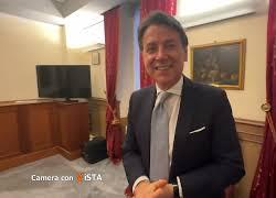 Il dietro la tenda dell'intervista con Conte del direttore di Agenzia Vista Alexander Jakhnagiev