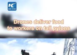 Cina: droni consegnano cibo a operai elettrici su tralicci alti 70 metri