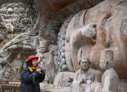 Cina: artisti italiani visitano le grotte rupestri di Dazu