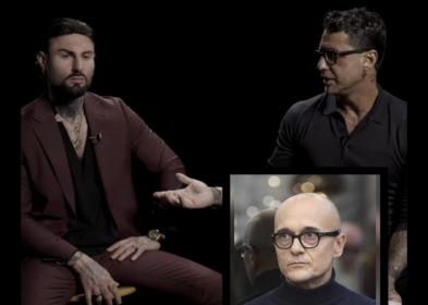 Falsissimo, Corona contro Signorini: "Vito Coppola portato di nascosto negli studi Gf e baciato", il personal trainer: "Mi ha messo la lingua in bocca"