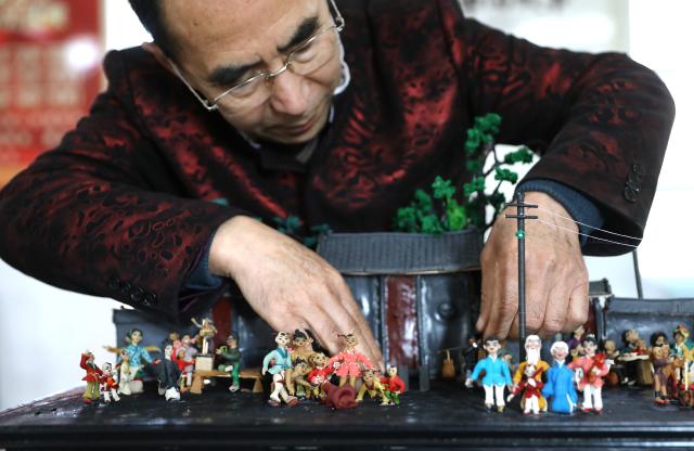 Cina: Liaoning, scultura in pasta di Chen a Yingkou