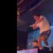 Fabrizio Corona sbatte la testa sul soffitto di una discoteca salendo sulla consolle, poi alza le braccia in segno di vittoria - VIDEO